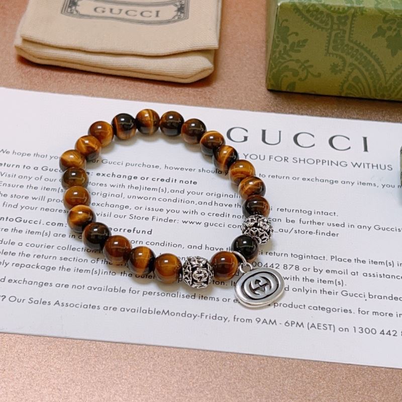 G*u*i bracelets